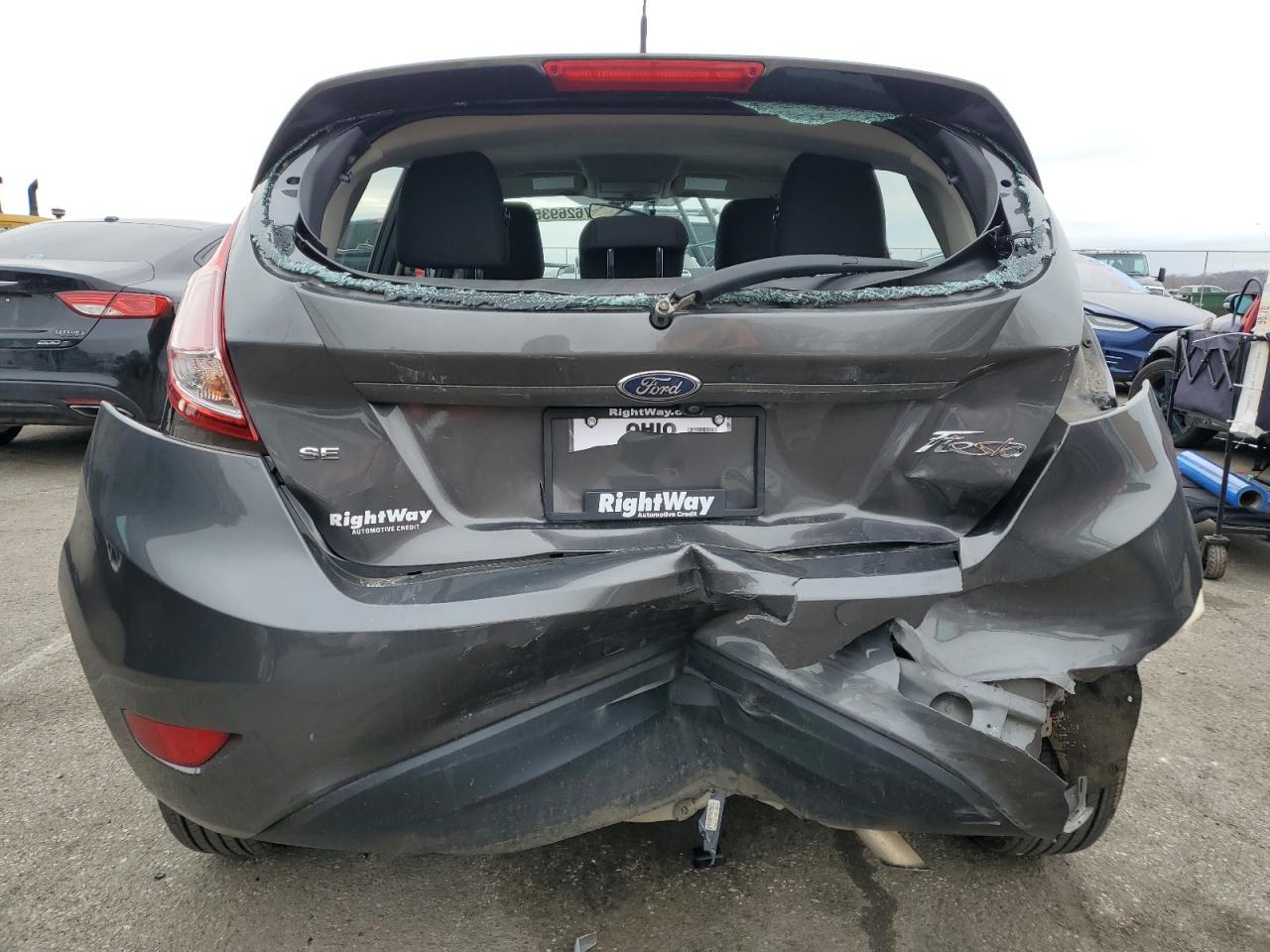 2018 Ford Fiesta VIN 3FADP4EJXJM138199 Copart auction photo, rear end damage thumbnail 6
