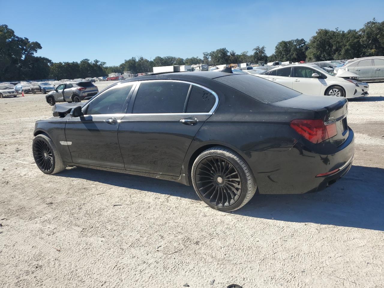 2015 BMW 7er VIN WBAYF4C50FD874041 Copart auction photo, front end damage thumbnail 2