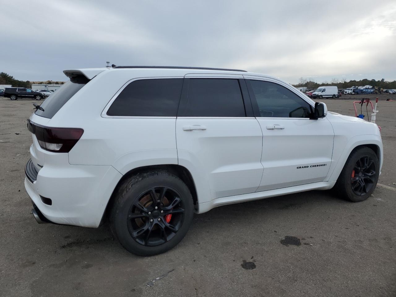 2013 Jeep Grand Cherokee VIN 1C4RJFDJ7DC586243 Copart auction photo, side / front end damage thumbnail 3