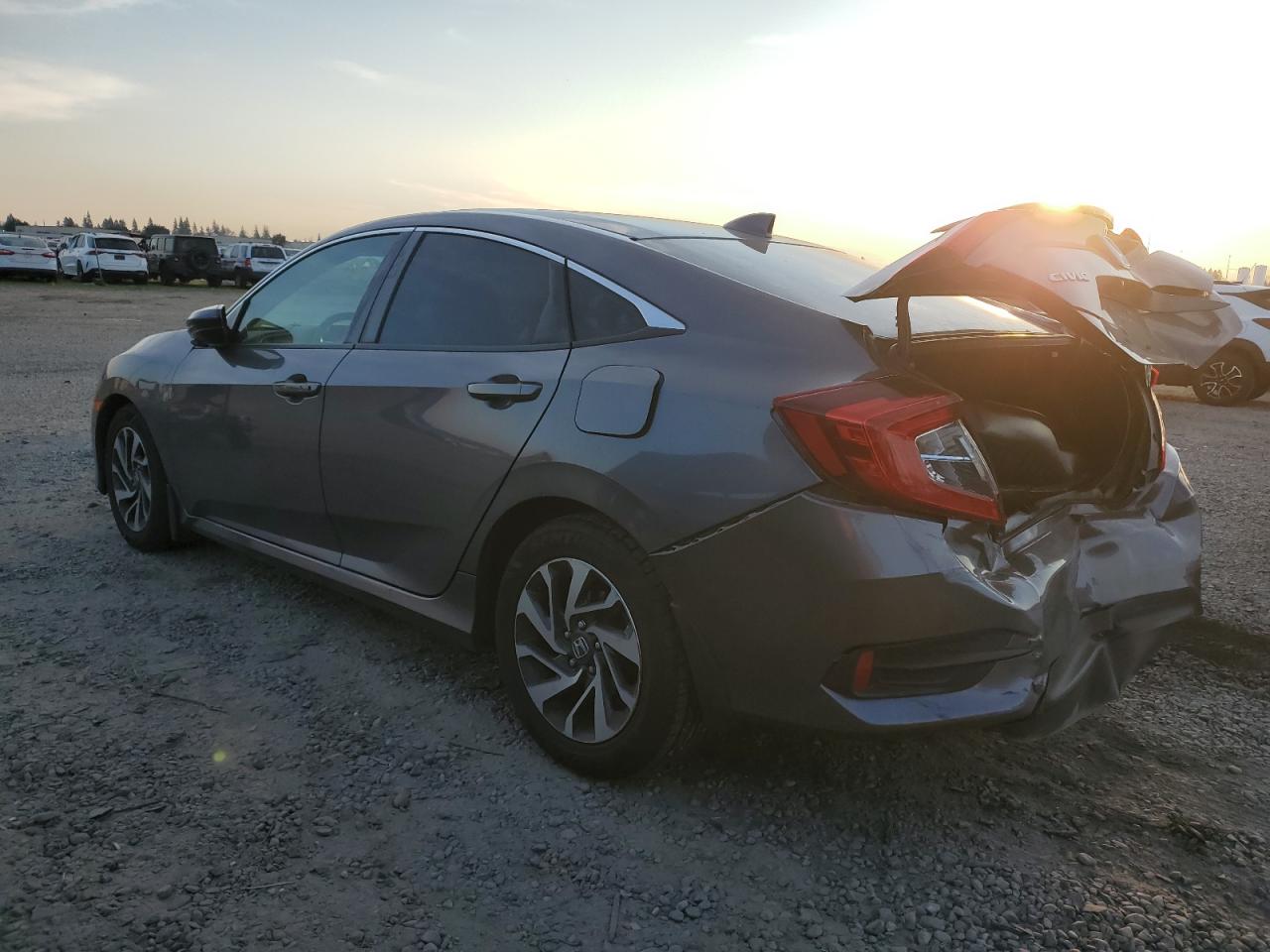 2018 Honda Civic VIN 19XFC2F71JE209550 Copart auction photo, rear end / front end damage thumbnail 2