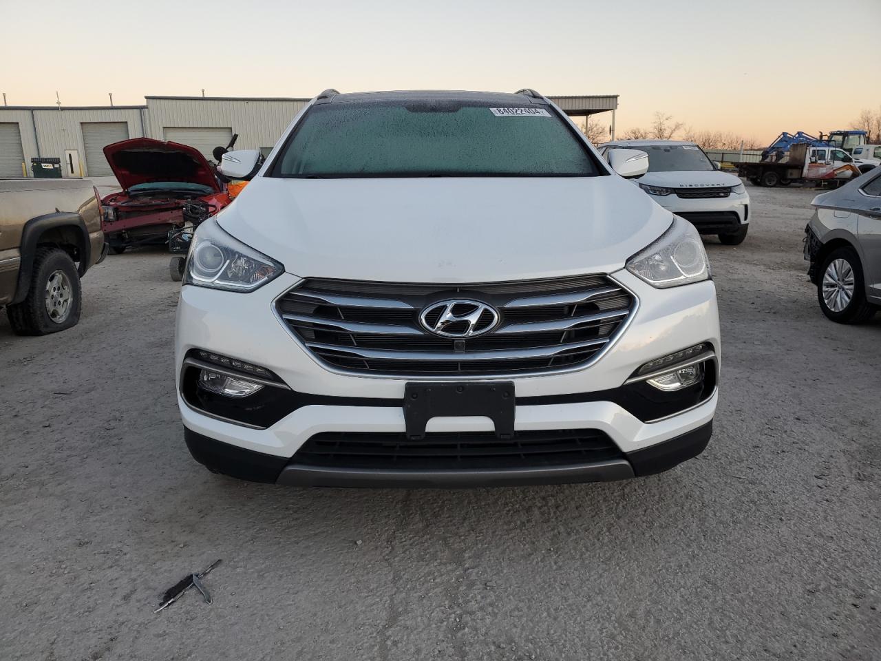 2017 Hyundai Santa Fe VIN 5XYZU3LB0HG454247 Copart auction photo, rear end / minor dent/scratches damage thumbnail 5