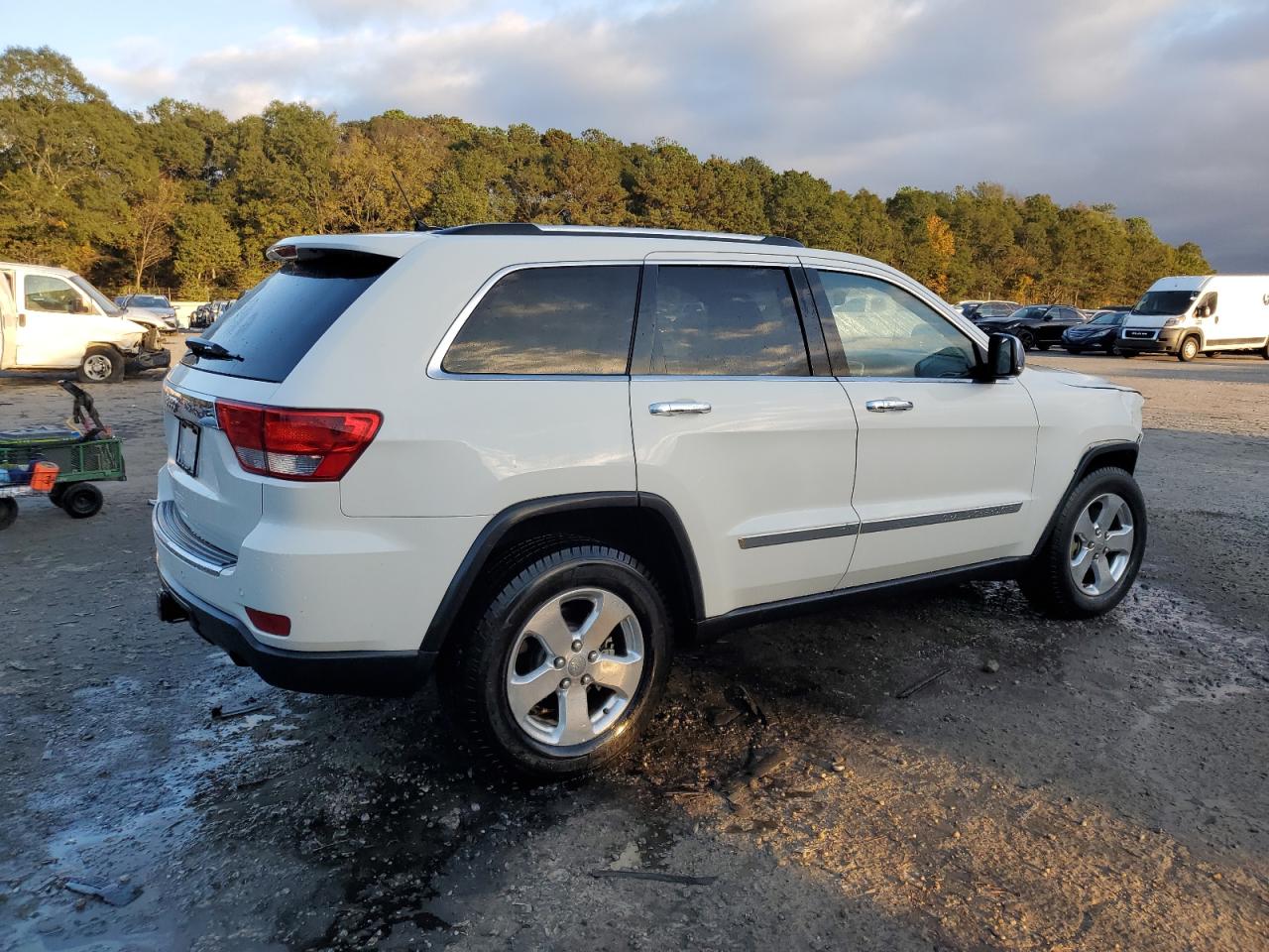 2012 Jeep Grand Cherokee VIN 1C4RJEBG2CC317065 Copart auction photo, front end / side damage thumbnail 3