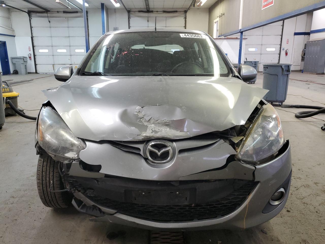 2012 Mazda 2 VIN JM1DE1LZ2C0146049 Copart auction photo, front end / side damage thumbnail 5
