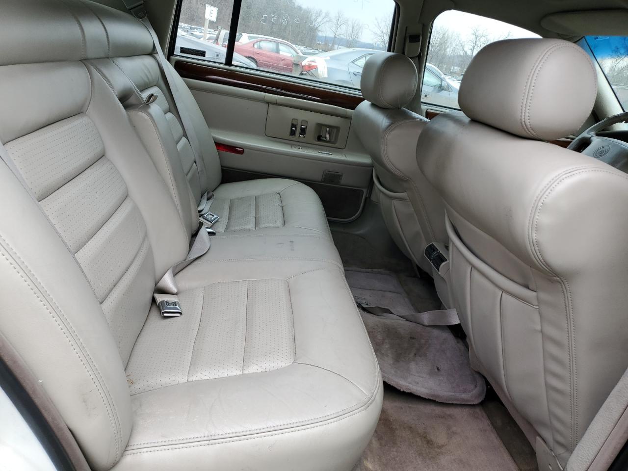 1996 Cadillac De Ville VIN 1G6KF5293TU294297 Copart auction photo, minor dent/scratches damage thumbnail 10