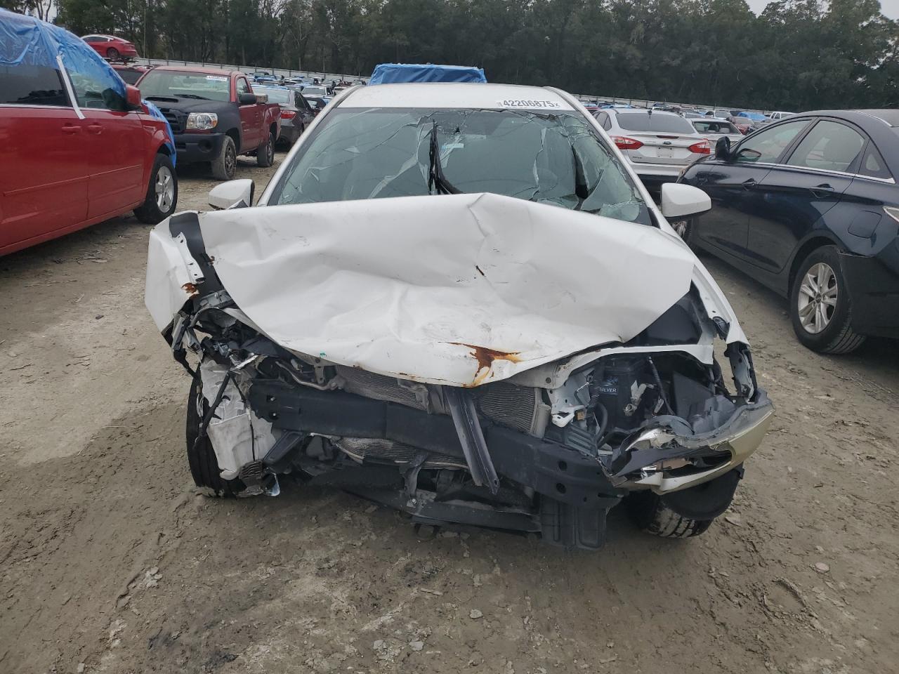 2016 Toyota Corolla VIN 5YFBURHE9GP520702 Copart auction photo, front end damage thumbnail 5