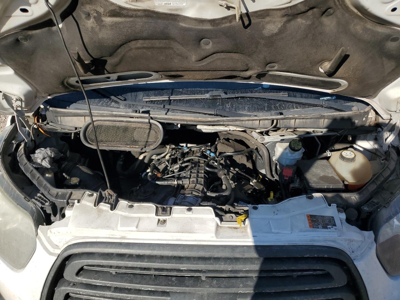 2015 Ford Transit VIN 1FTNE1ZGXFKA90171 Copart auction photo, side / rear end damage thumbnail 14