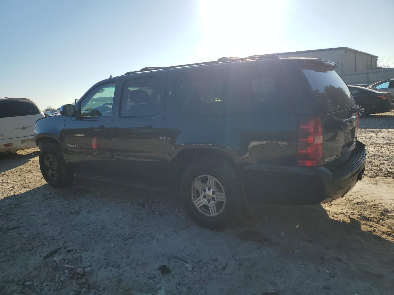 2011 Chevrolet Suburban VIN 1GNSCHE01BR155461 Copart auction photo, front end / rear end damage thumbnail 2