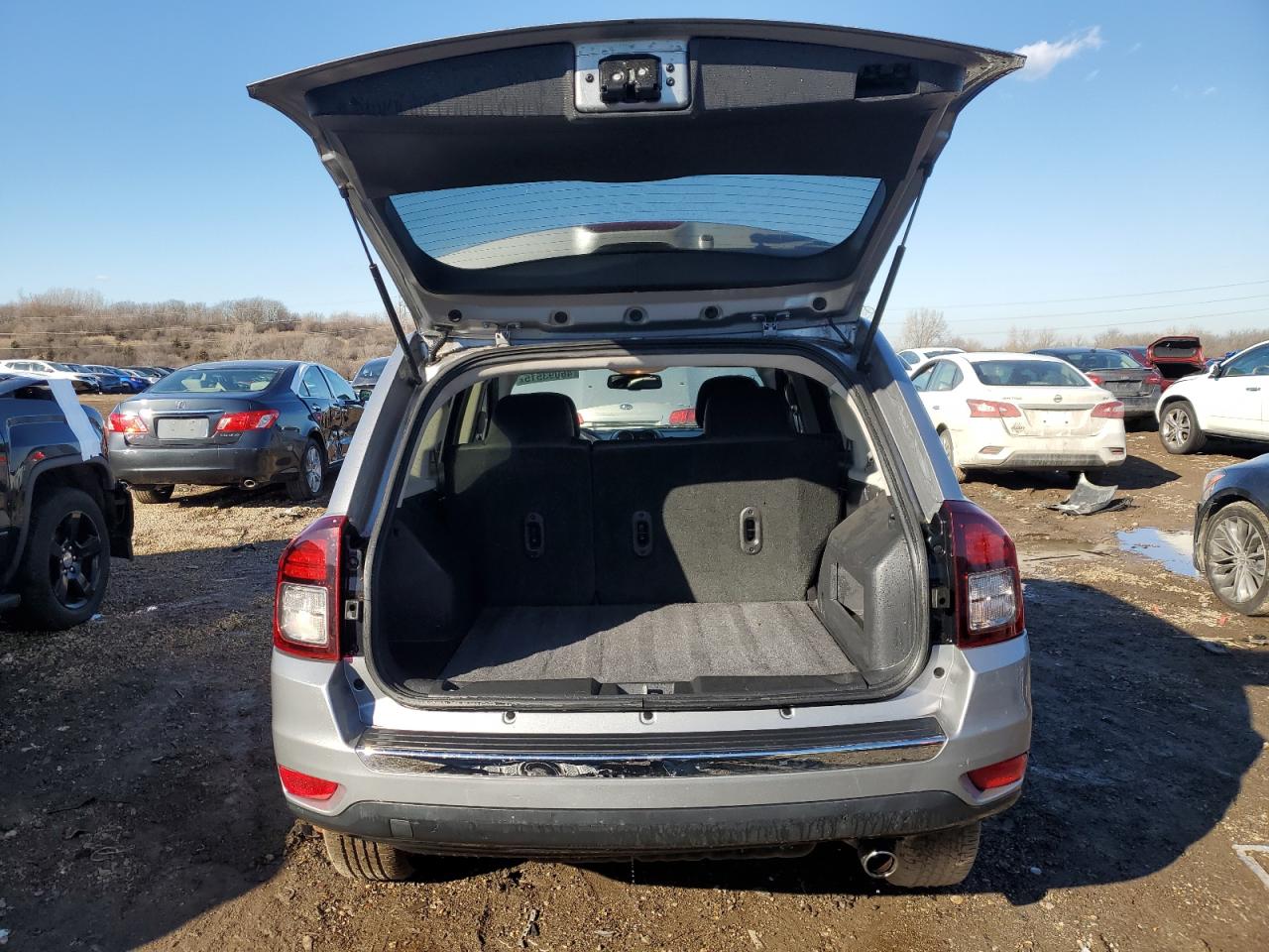 2016 Jeep Compass VIN 1C4NJDEB0GD598257 Copart auction photo, front end / side damage thumbnail 6