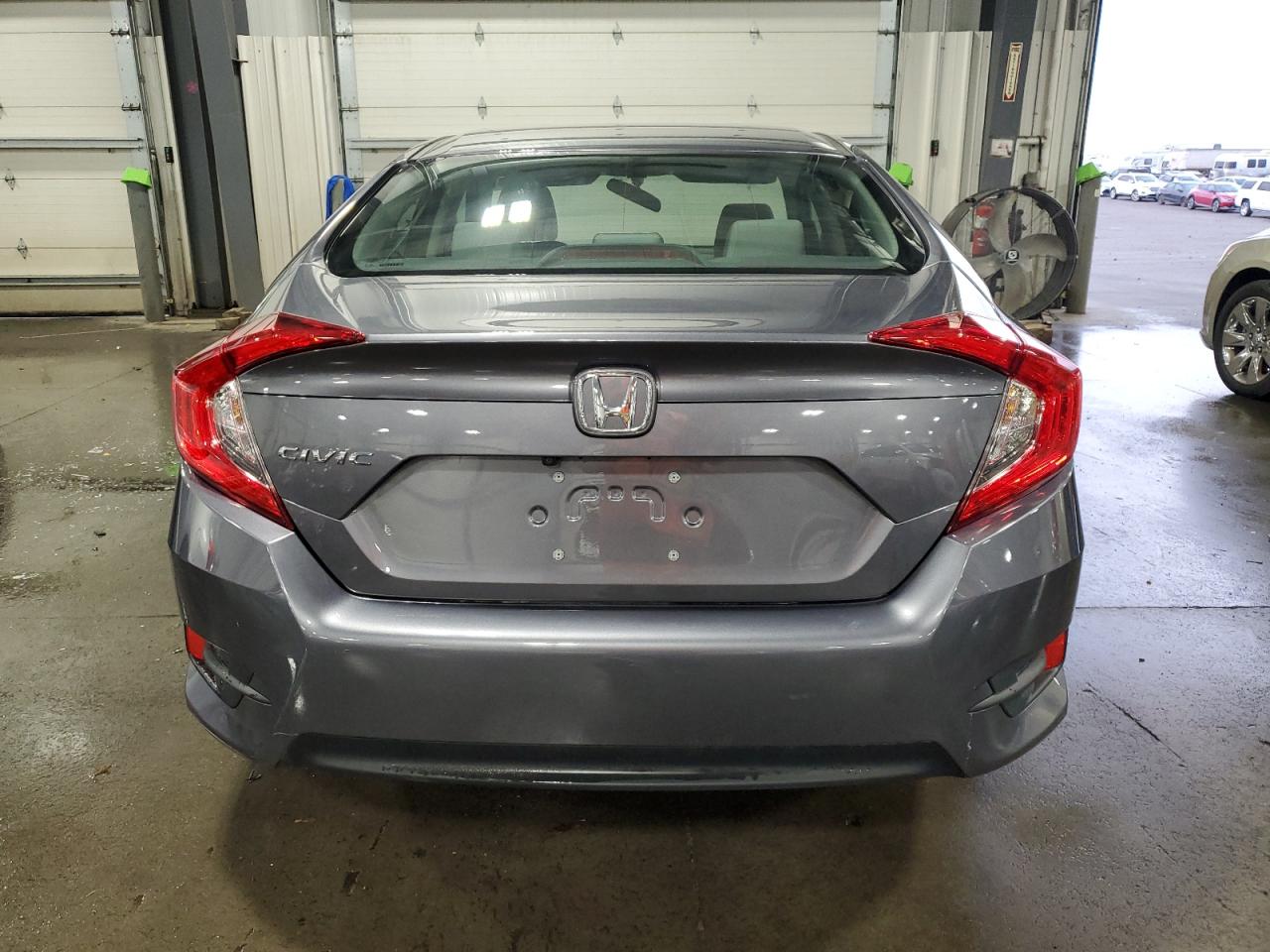 2018 Honda Civic VIN 19XFC2F50JE022122 Copart auction photo, side / front end damage thumbnail 6