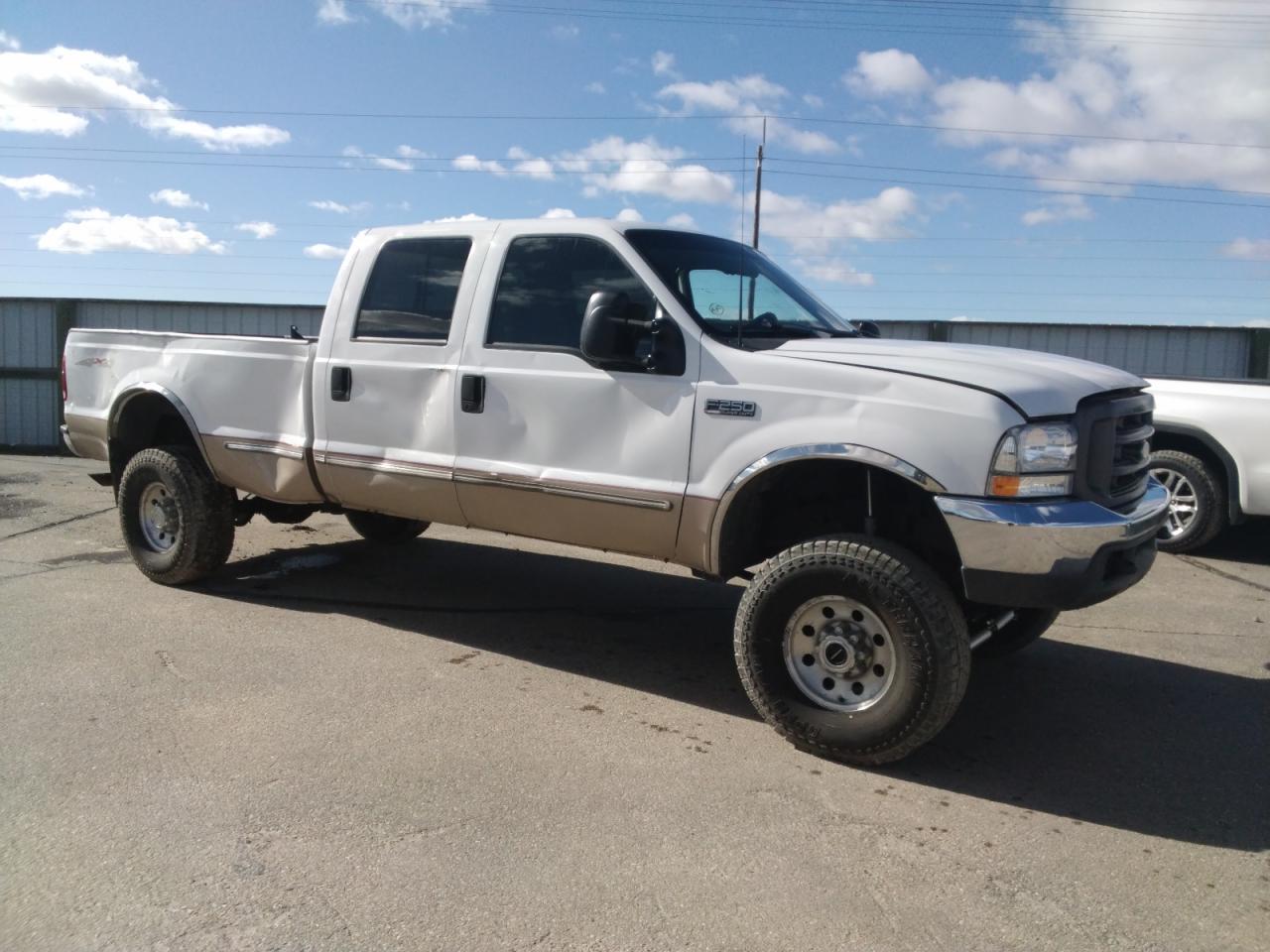 1999 Ford F250 VIN 1FTNW21F0XEA24718 Copart auction photo, all over damage thumbnail 4