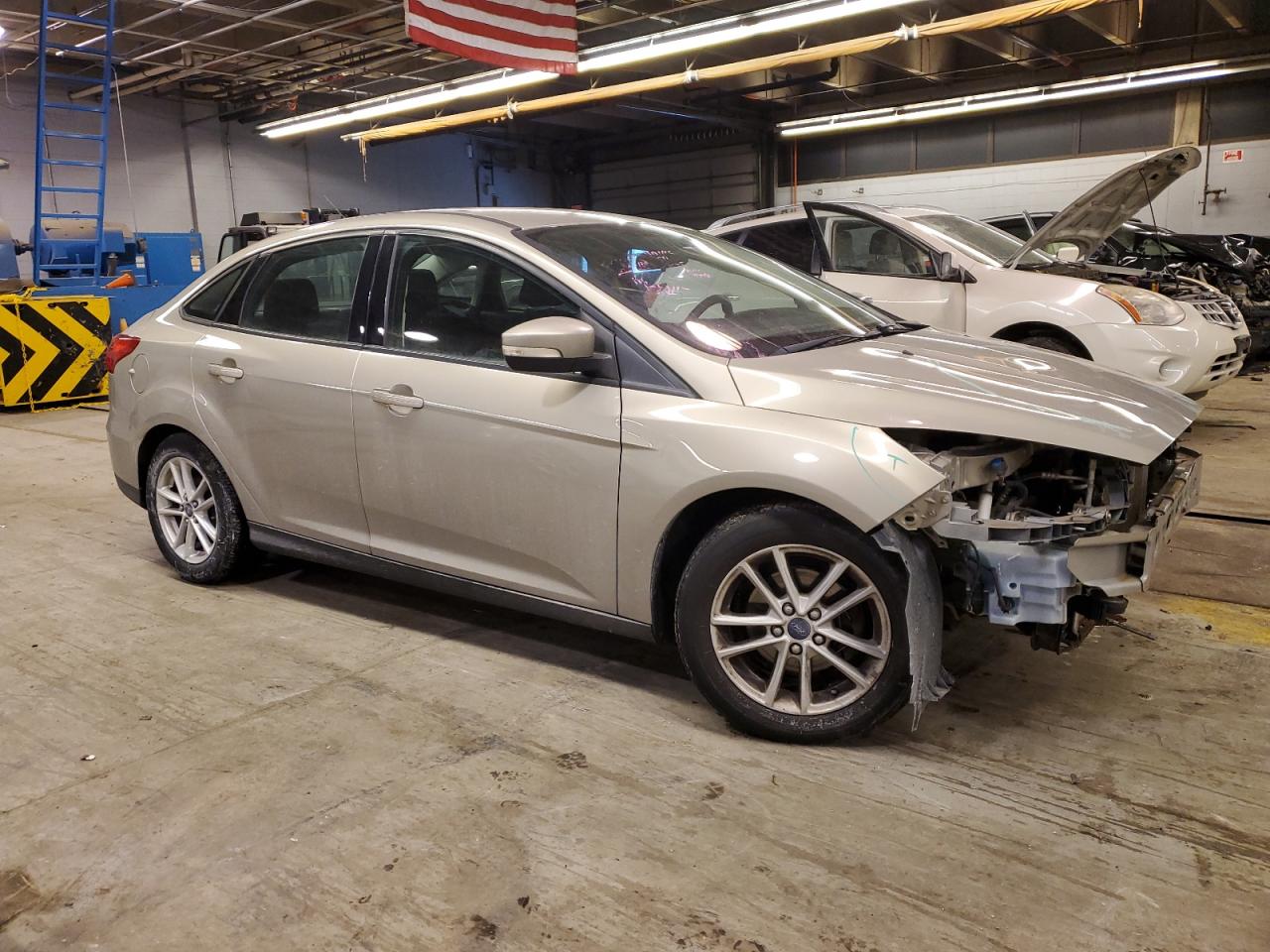 2015 Ford Focus VIN 1FADP3F24FL295477 Copart auction photo, stripped damage thumbnail 4