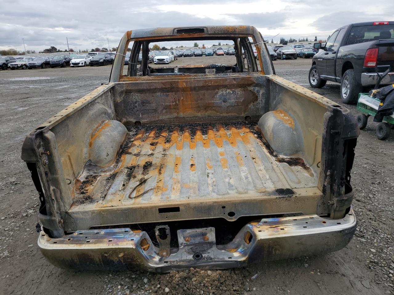2012 Dodge RAM VIN 1C6RD7KTXCS205661 Copart auction photo, burn damage thumbnail 6