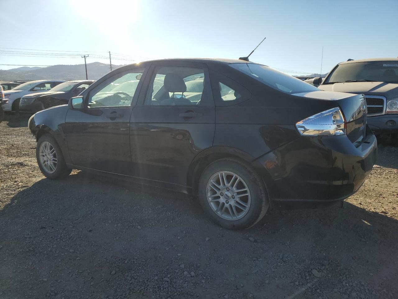 2009 Ford Focus VIN 1FAHP35N09W267112 Copart auction photo, front end / rear end damage thumbnail 2