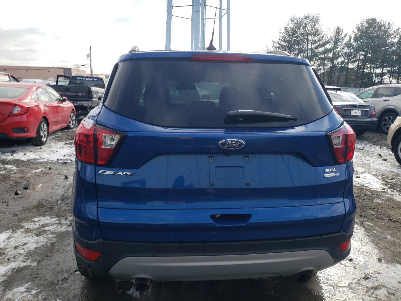 2019 Ford Escape VIN 1FMCU9HD9KUA66552 Copart auction photo, all over damage thumbnail 6