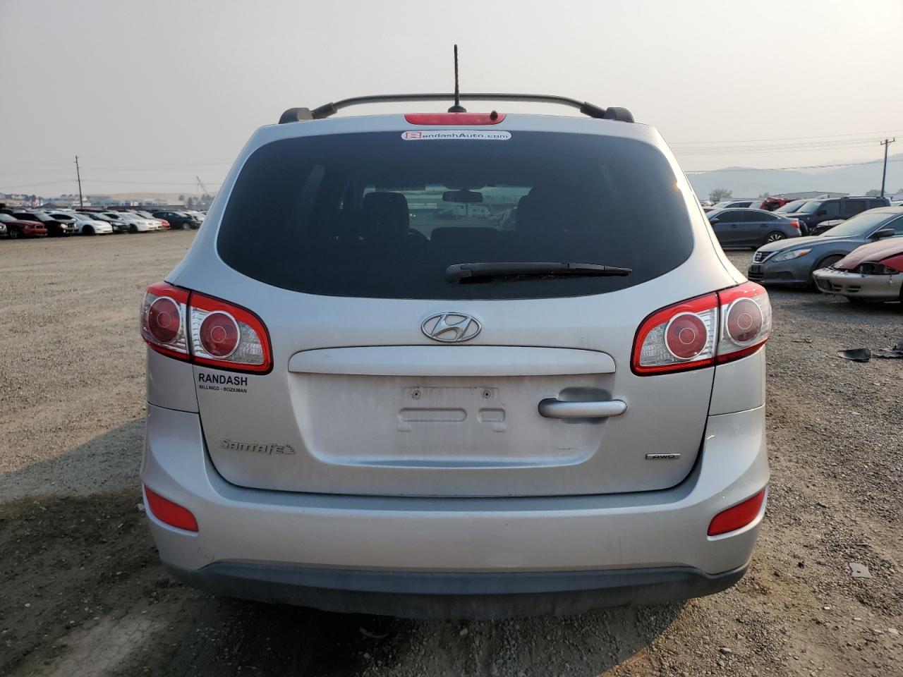 2012 Hyundai Santa Fe VIN 5XYZGDAB5CG113094 Copart auction photo, front end / side damage thumbnail 6