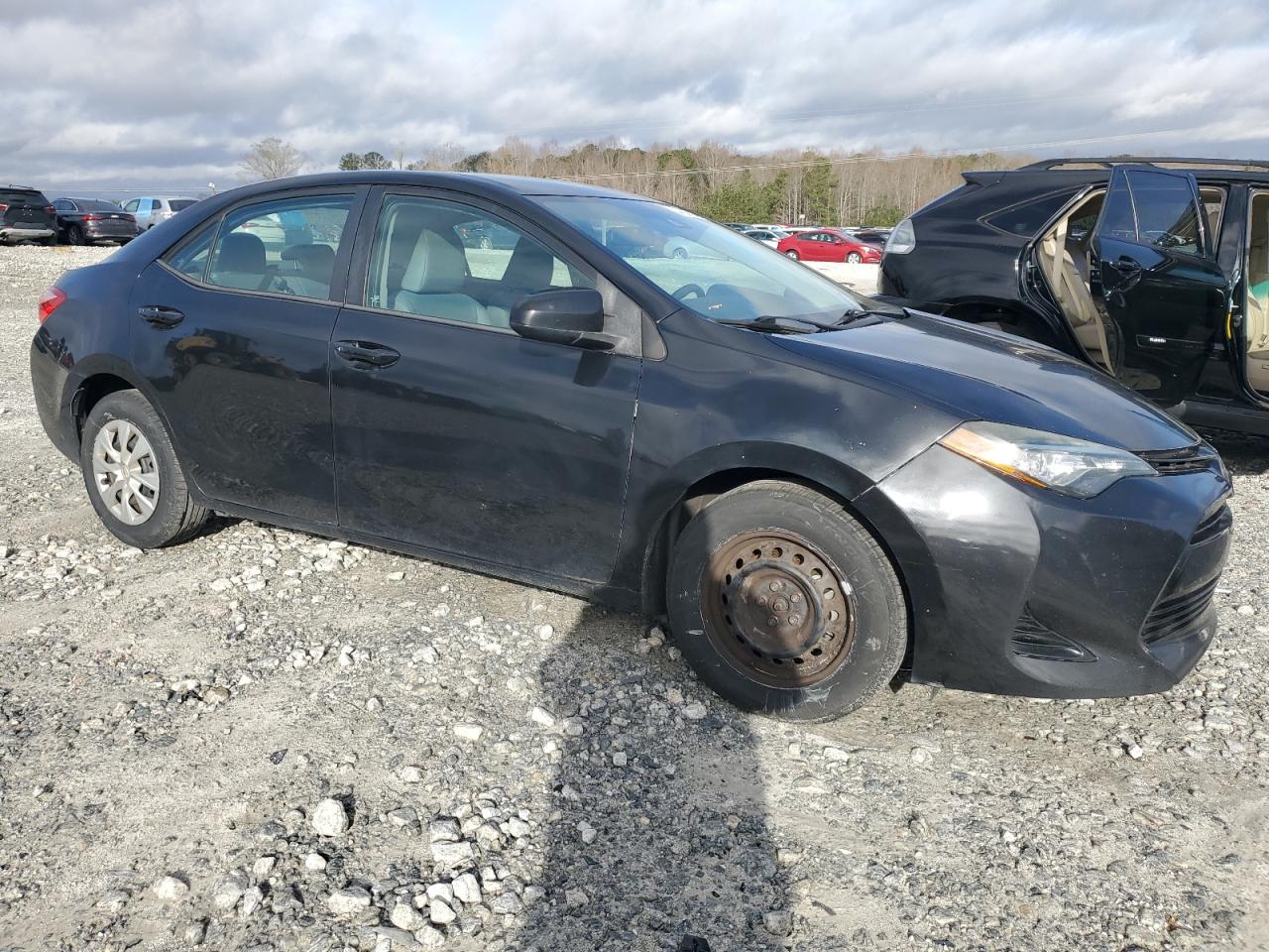 2017 Toyota Corolla VIN 5YFBURHE9HP616587 Copart auction photo, minor dent/scratches damage thumbnail 4