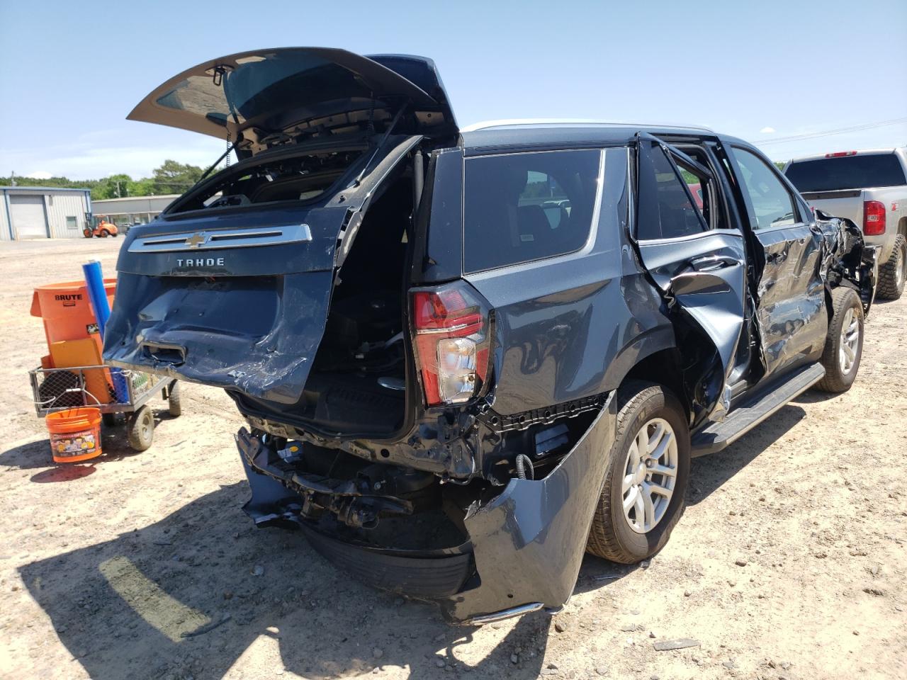 2021 Chevrolet Tahoe VIN 1GNSCNKD5MR277071 Copart auction photo, all over / minor dent/scratches damage thumbnail 4