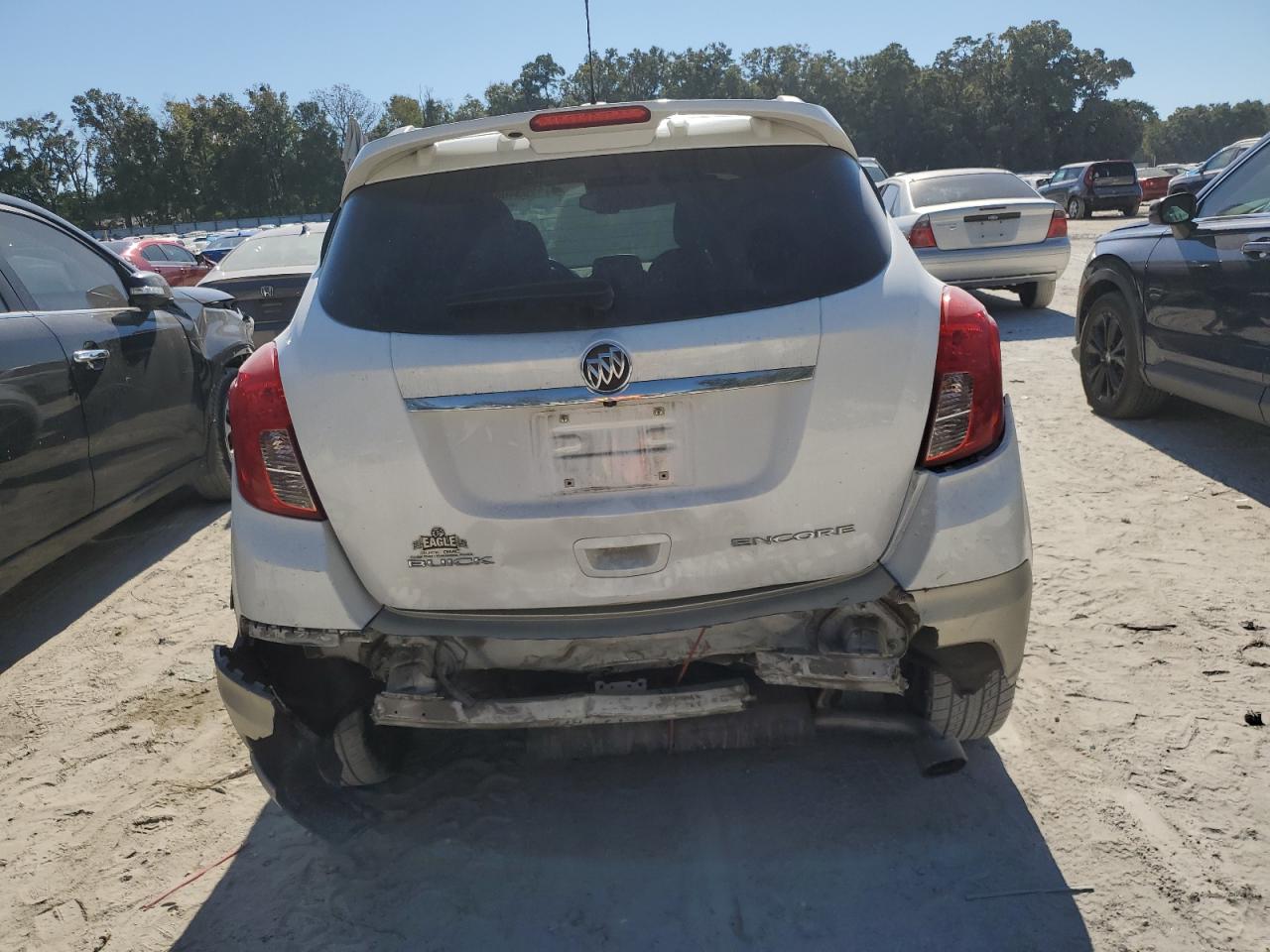 2016 Buick Encore VIN KL4CJ1SM4GB594181 Copart auction photo, rear end / minor dent/scratches damage thumbnail 6