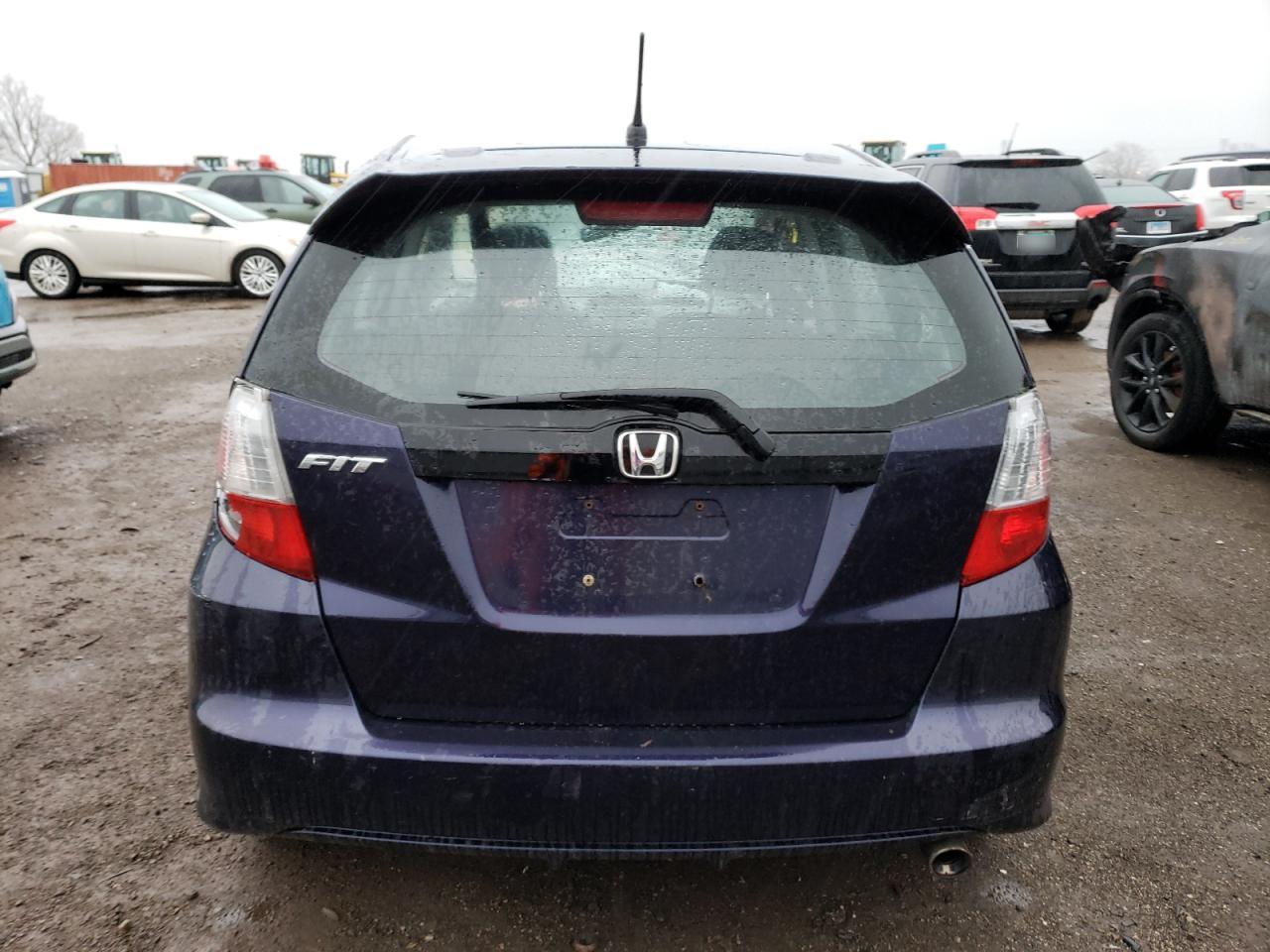 2010 Honda Fit VIN JHMGE8H45AC016943 Copart auction photo, front end / side damage thumbnail 6