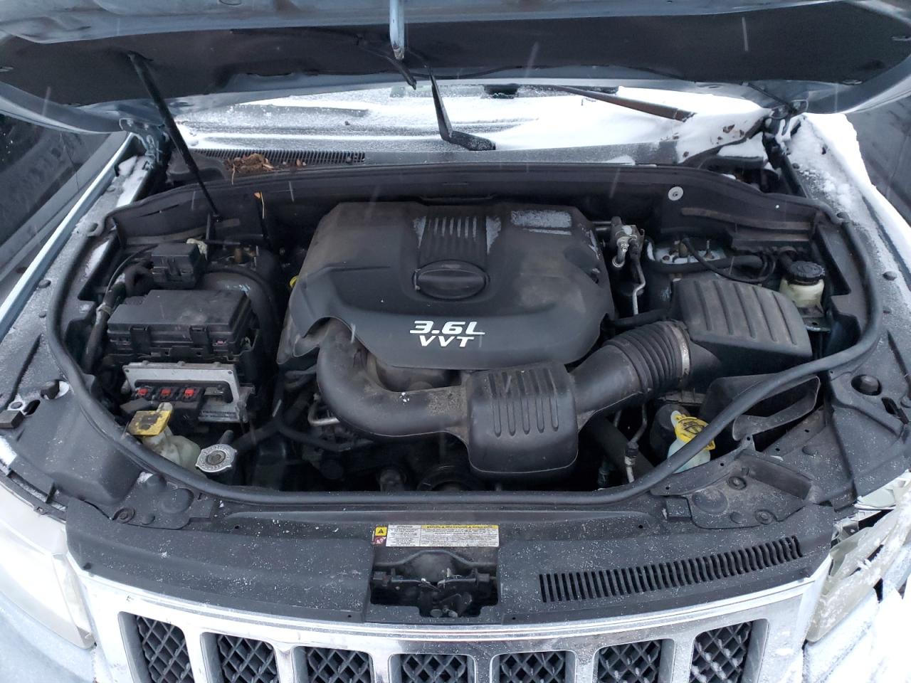 2012 Jeep Grand Cherokee VIN 1C4RJFCG3CC202916 Copart auction photo, front end / minor dent/scratches damage thumbnail 11