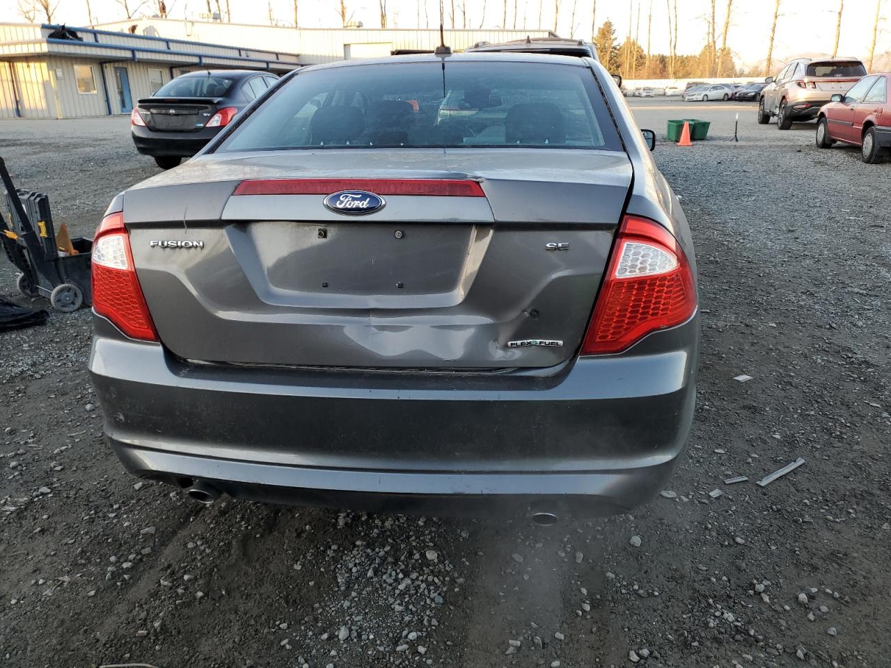 2012 Ford Fusion VIN 3FAHP0HG1CR321149 Copart auction photo, undercarriage / rear end damage thumbnail 6