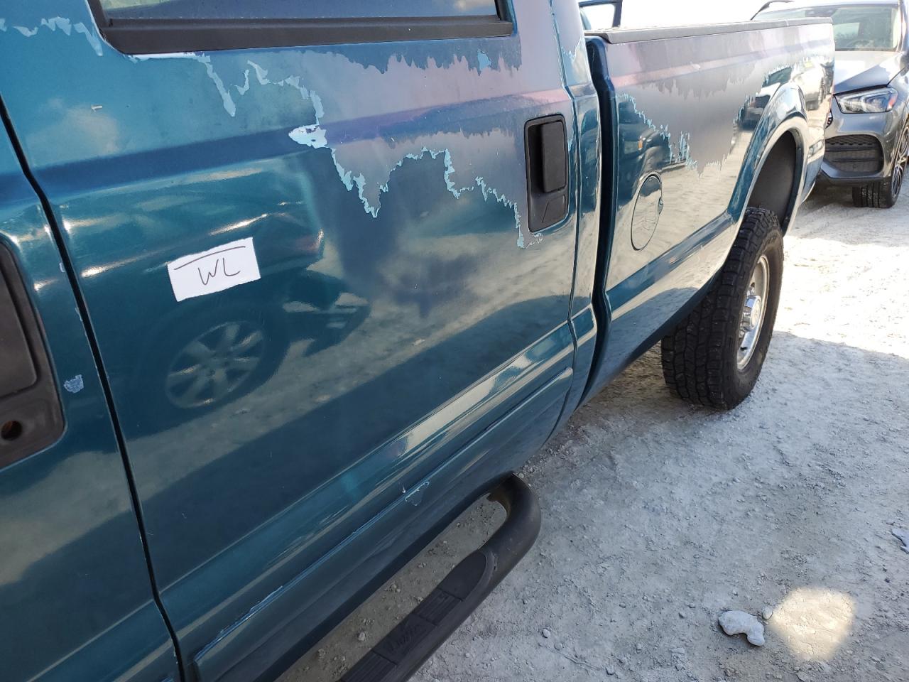 2001 Ford F350 VIN 3FTSW31F21MA55009 Copart auction photo, water/flood damage thumbnail 12