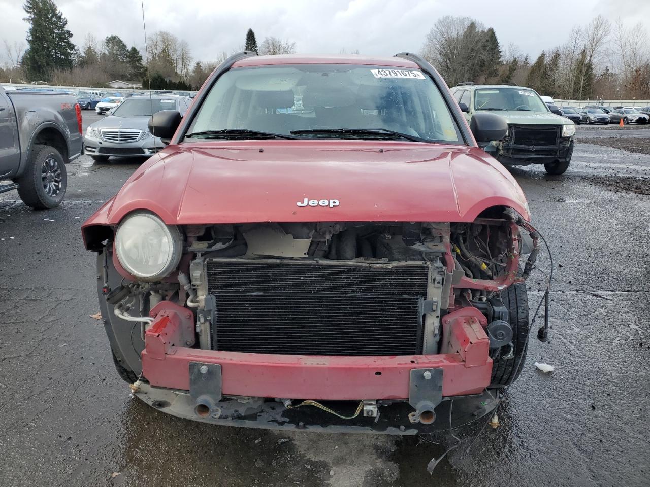 2010 Jeep Compass VIN 1J4NF4FB6AD511219 Copart auction photo, front end / undercarriage damage thumbnail 5