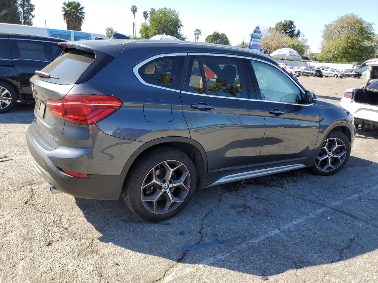 2018 BMW X1 VIN WBXHU7C33J3H42663 Copart auction photo, water/flood / minor dent/scratches damage thumbnail 3