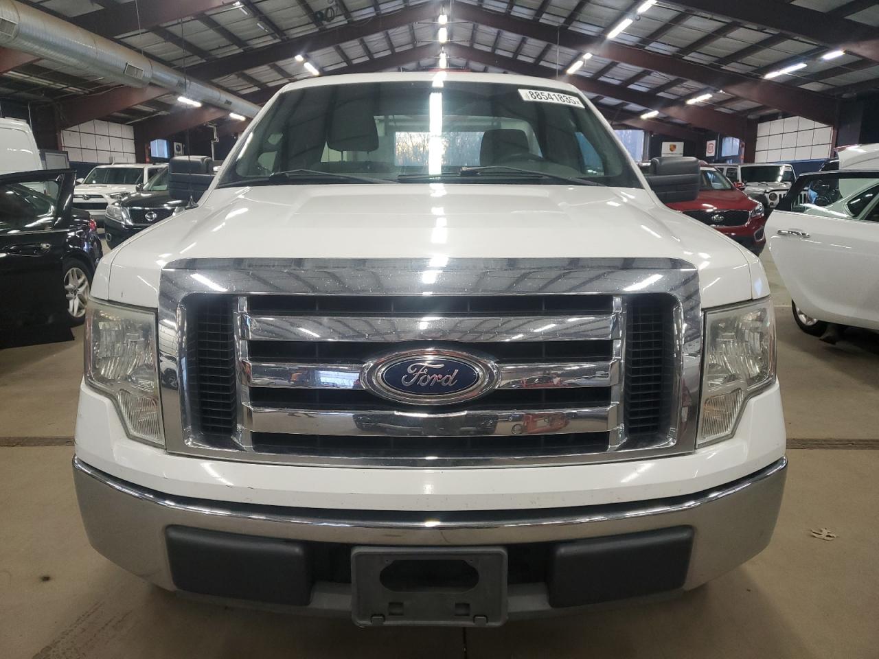 2011 Ford F-150 VIN 1FTNF1CF7BKD63347 Copart auction photo, minor dent/scratches damage thumbnail 5