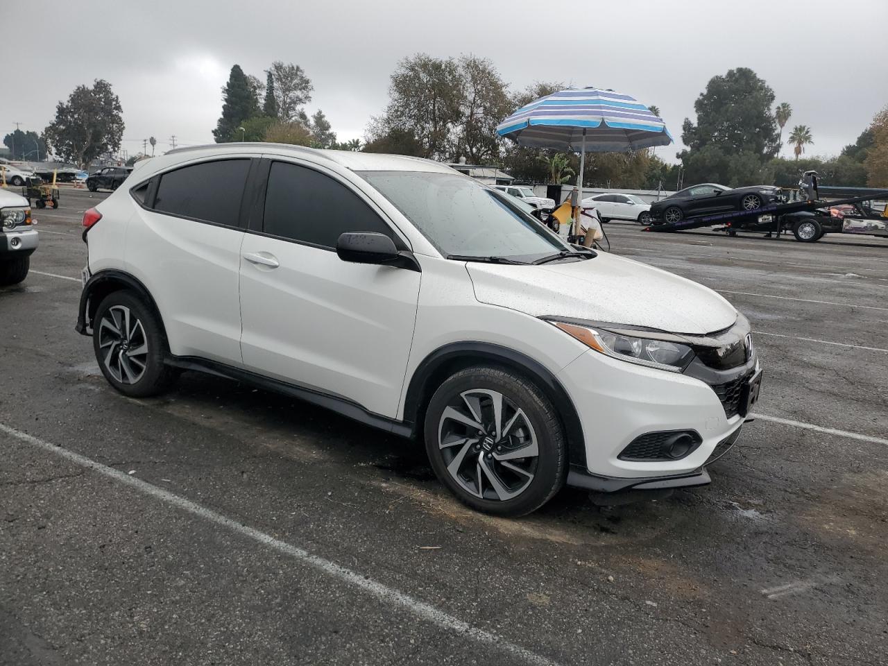 2020 Honda HR-V VIN 3CZRU5H15LM717947 Copart auction photo, rear end / minor dent/scratches damage thumbnail 4