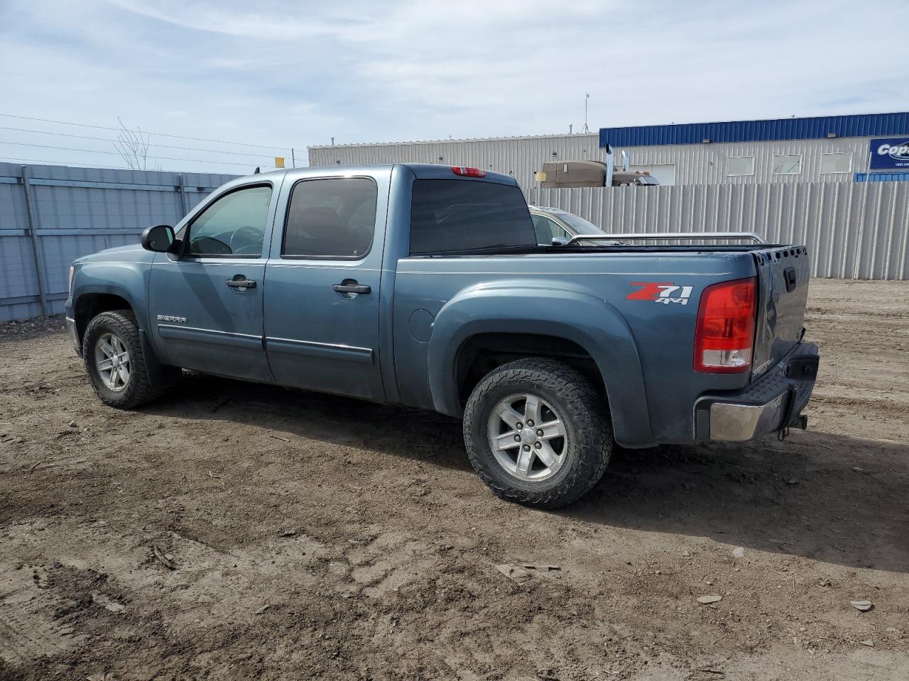 2011 GMC Sierra VIN 3GTP2VE32BG283850 Copart auction photo, rear end / hail damage thumbnail 2