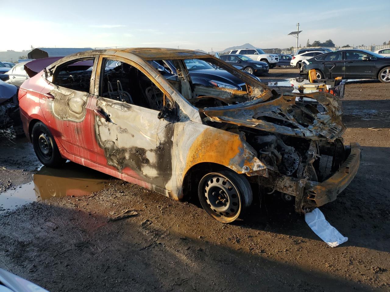 2015 Hyundai Accent VIN KMHCT4AE7FU863302 Copart auction photo, burn damage thumbnail 4