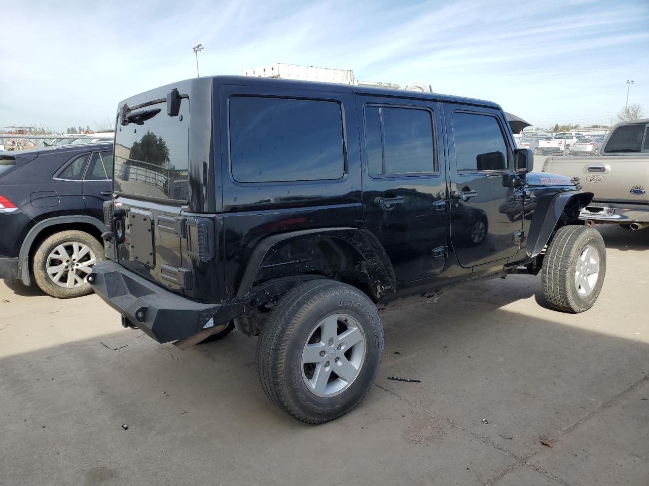 2016 Jeep Wrangler VIN 1C4BJWDG0GL280057 Copart auction photo, side damage thumbnail 3