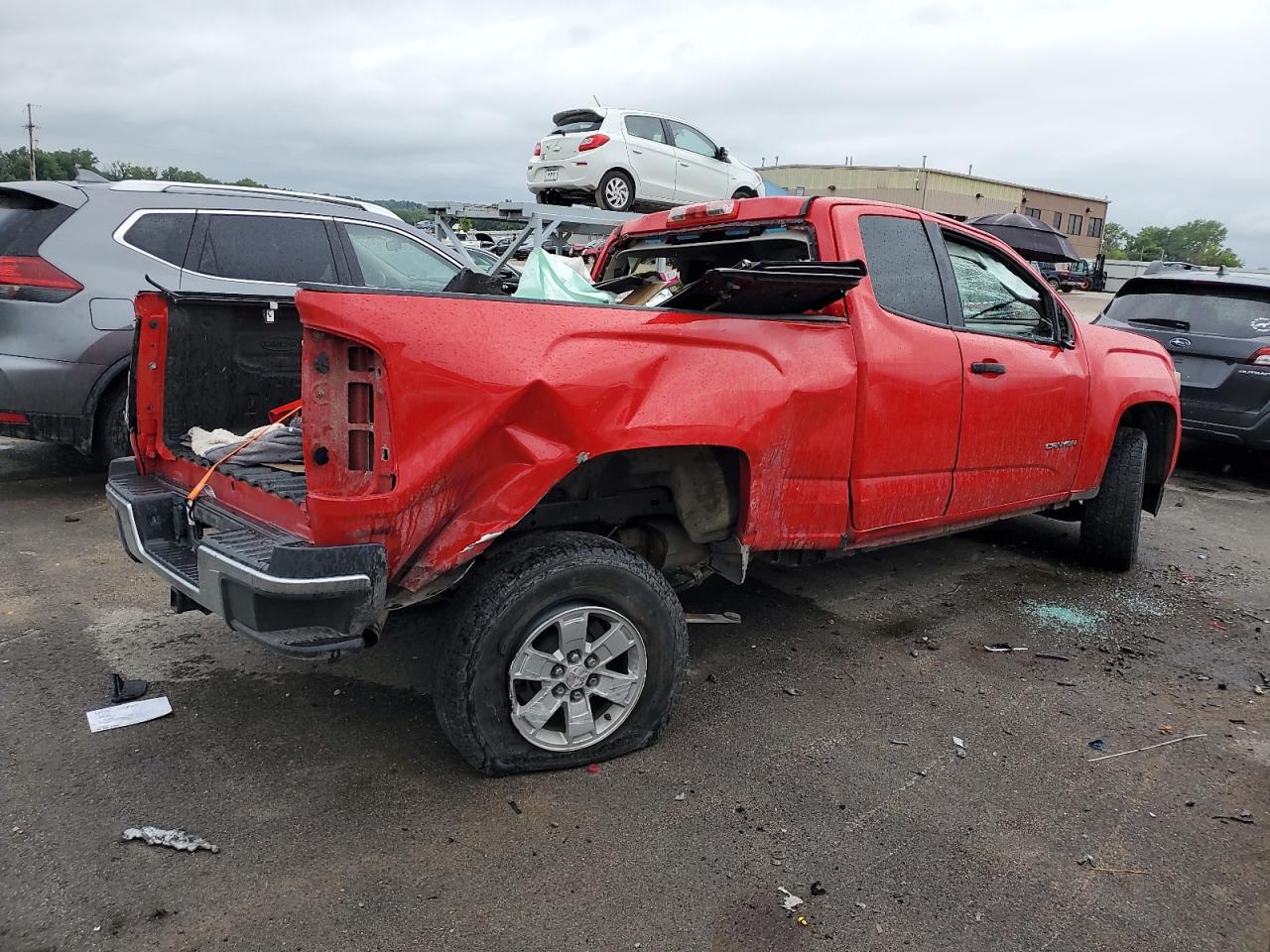 2016 GMC Canyon VIN 1GTH5BE30G1373742 Copart auction photo, all over damage thumbnail 3