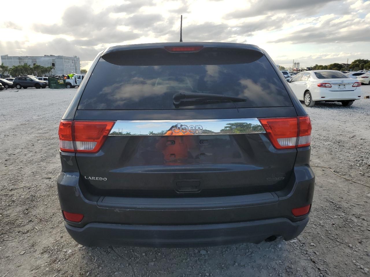 2012 Jeep Grand Cherokee VIN 1C4RJEAG5CC227829 Copart auction photo, front end damage thumbnail 6