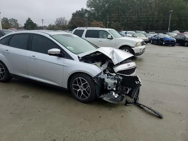 2018 Ford Focus VIN 1FADP3H23JL299235 Copart auction photo, front end damage thumbnail 11