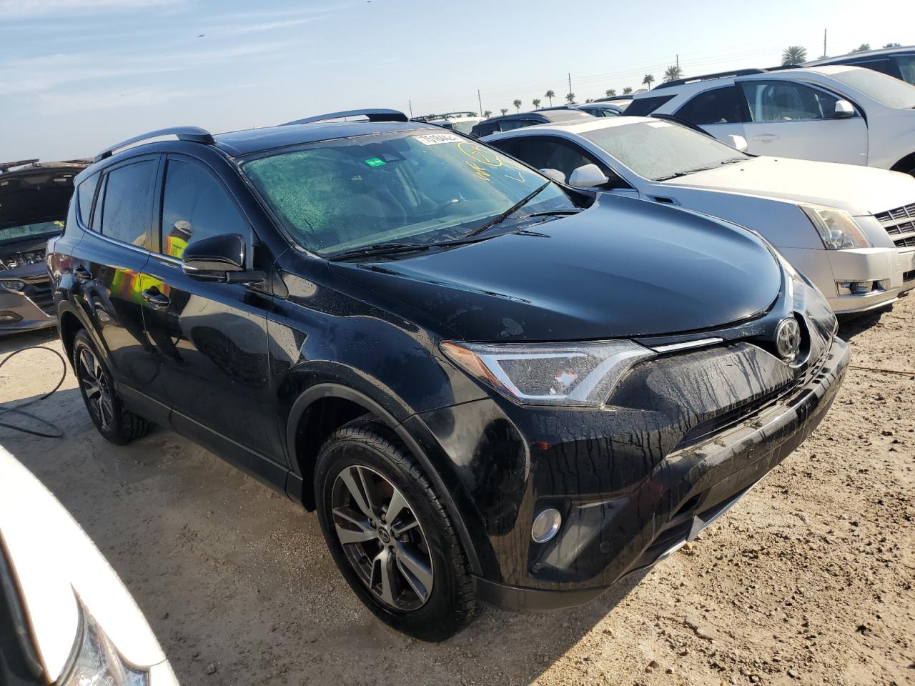2018 Toyota RAV 4 VIN 2T3WFREV7JW455233 Copart auction photo, water/flood damage thumbnail 4