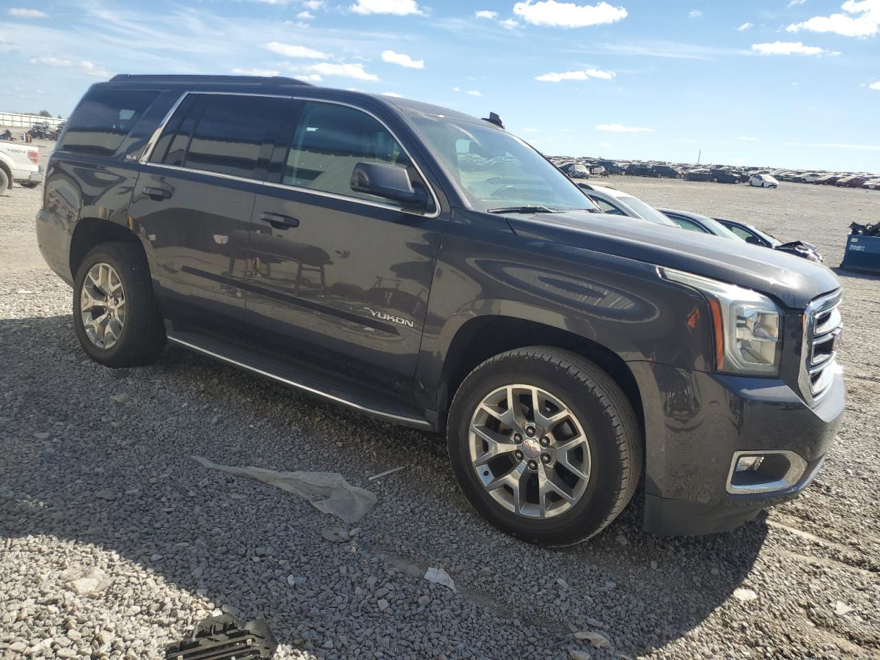 2016 GMC Yukon VIN 1GKS2AKC1GR402880 Copart auction photo, rear end / side damage thumbnail 4