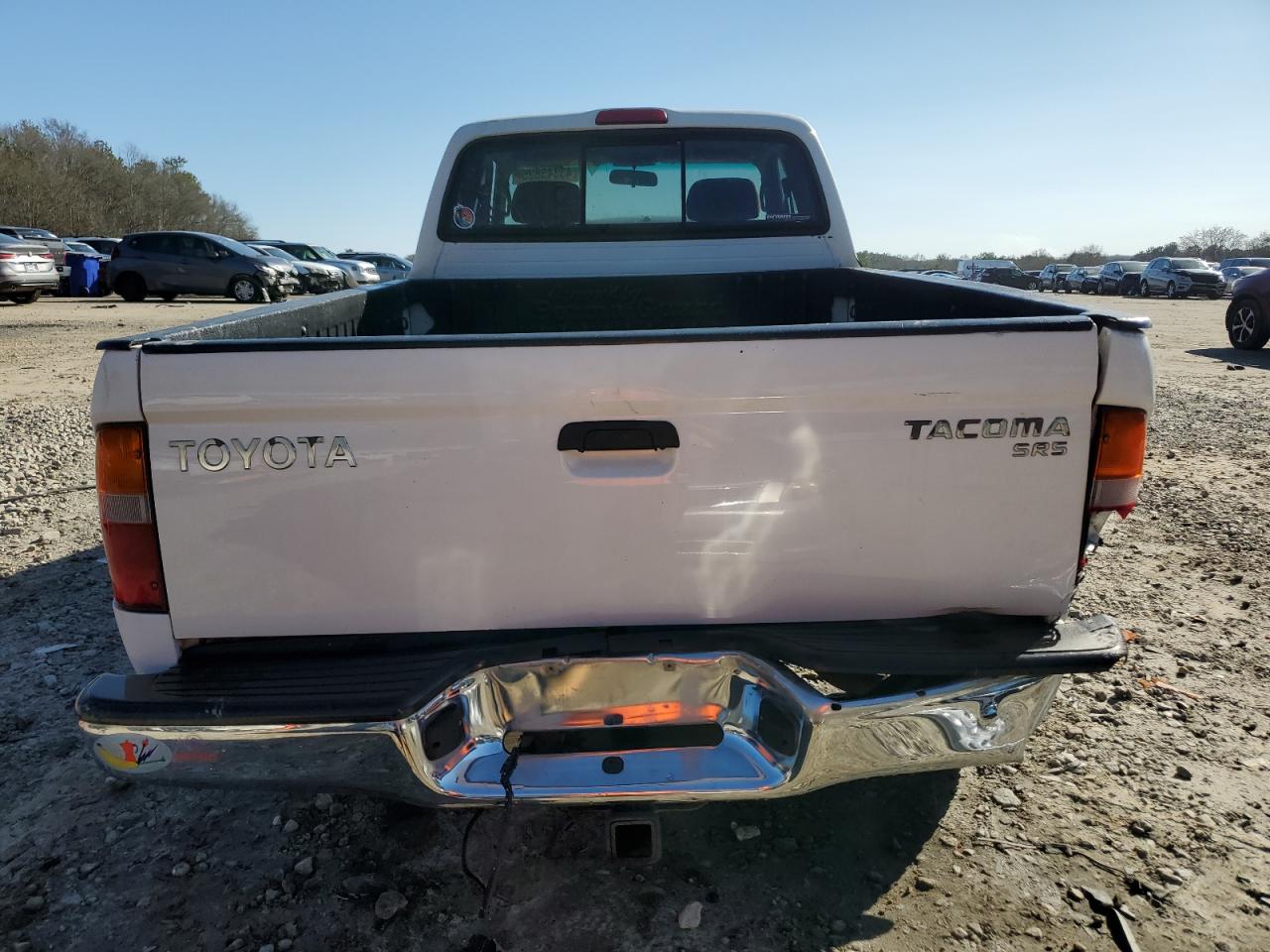 1999 Toyota Tacoma VIN 4TAWM72N0XZ423582 Copart auction photo, all over damage thumbnail 6