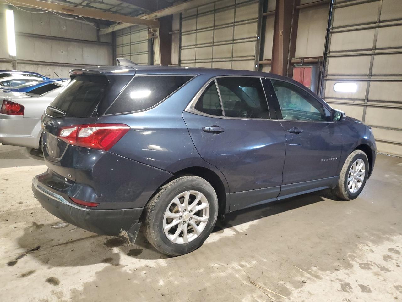 2018 Chevrolet Equinox VIN 3GNAXJEV5JL370642 Copart auction photo, rear end / minor dent/scratches damage thumbnail 3
