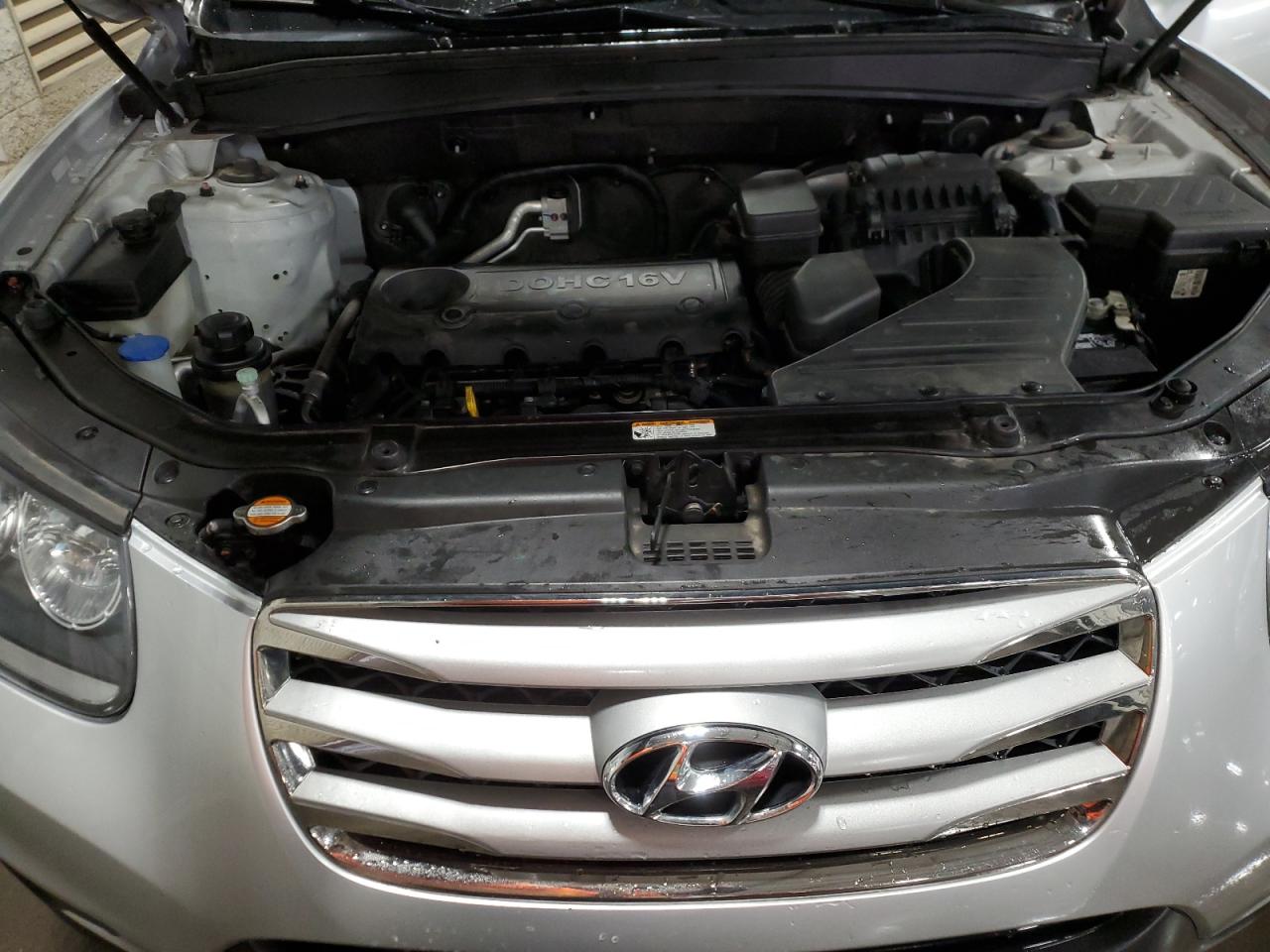 2012 Hyundai Santa Fe VIN 5XYZGDAB6CG162935 Copart auction photo, front end damage thumbnail 13