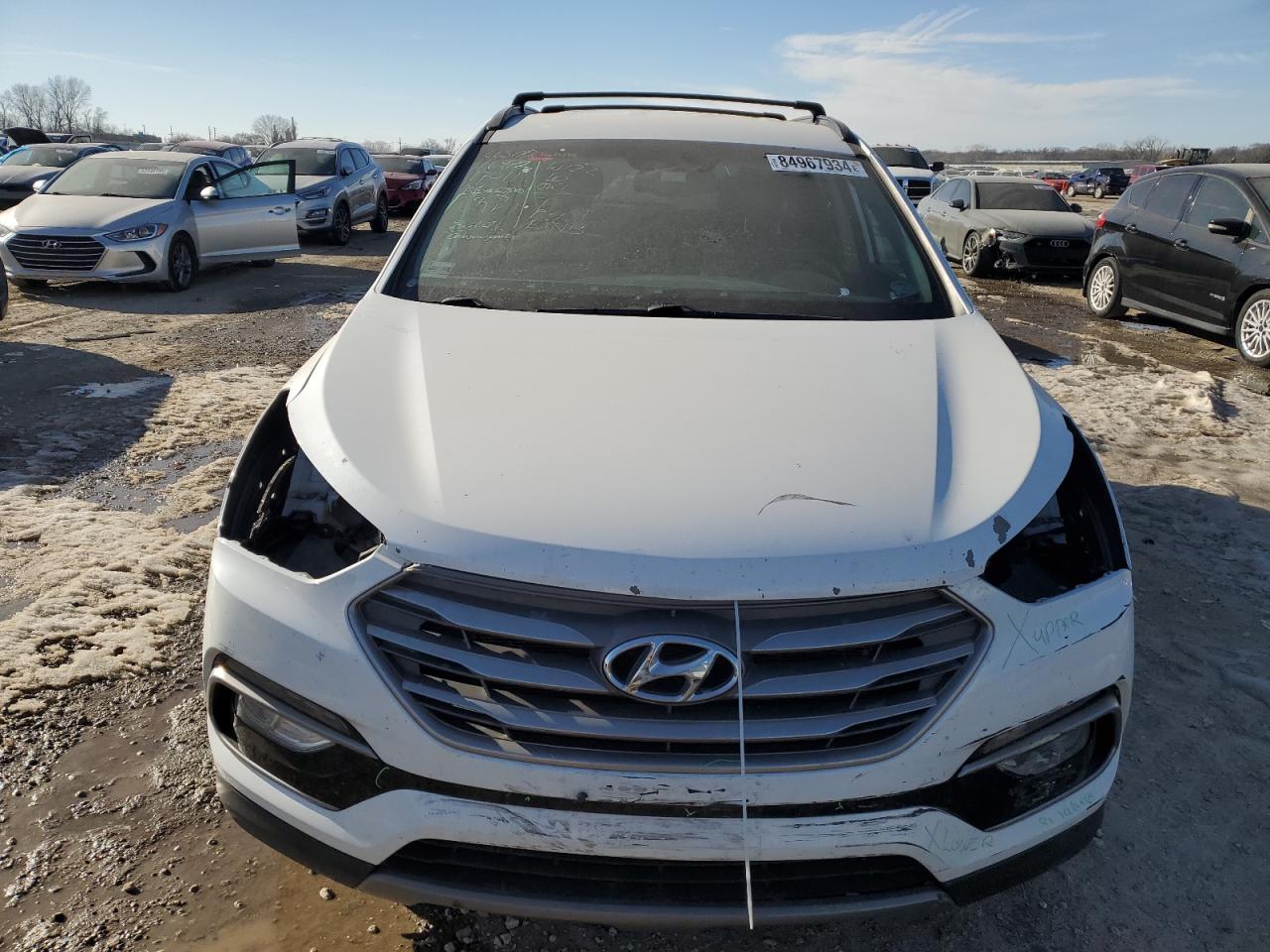 2018 Hyundai Santa Fe VIN 5XYZU3LB9JG527721 Copart auction photo, vandalism damage thumbnail 5