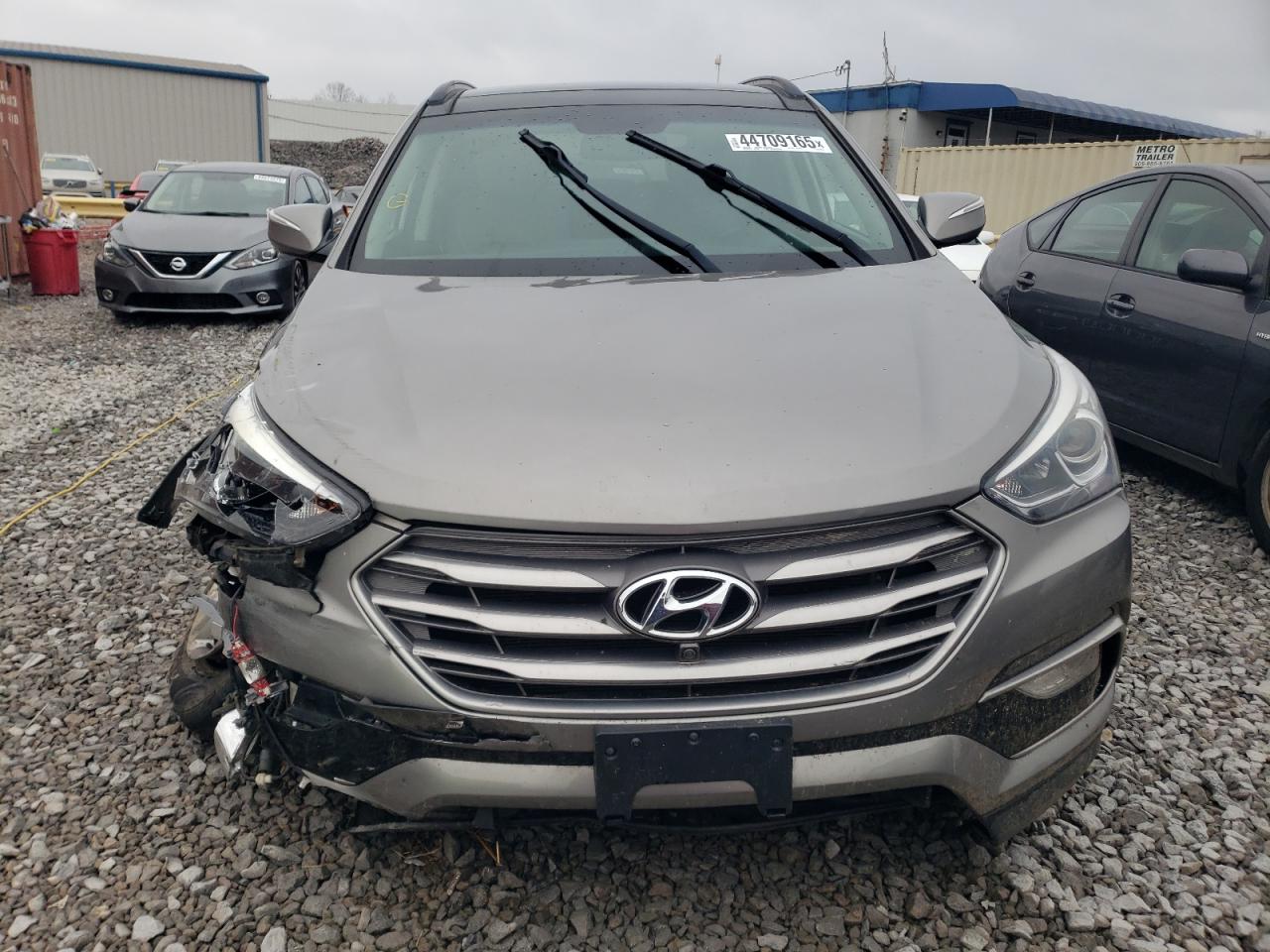 2017 Hyundai Santa Fe VIN 5NMZU3LBXHH035179 Copart auction photo, front end / rear end damage thumbnail 5