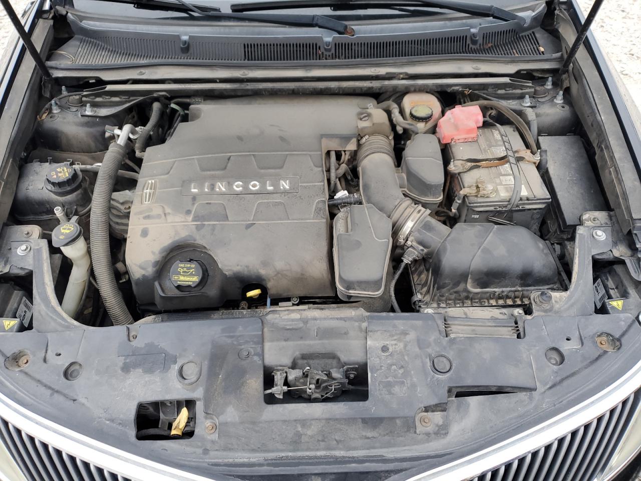 2014 Lincoln MKS VIN 1LNHL9DK7EG601894 Copart auction photo, side / normal wear damage thumbnail 11