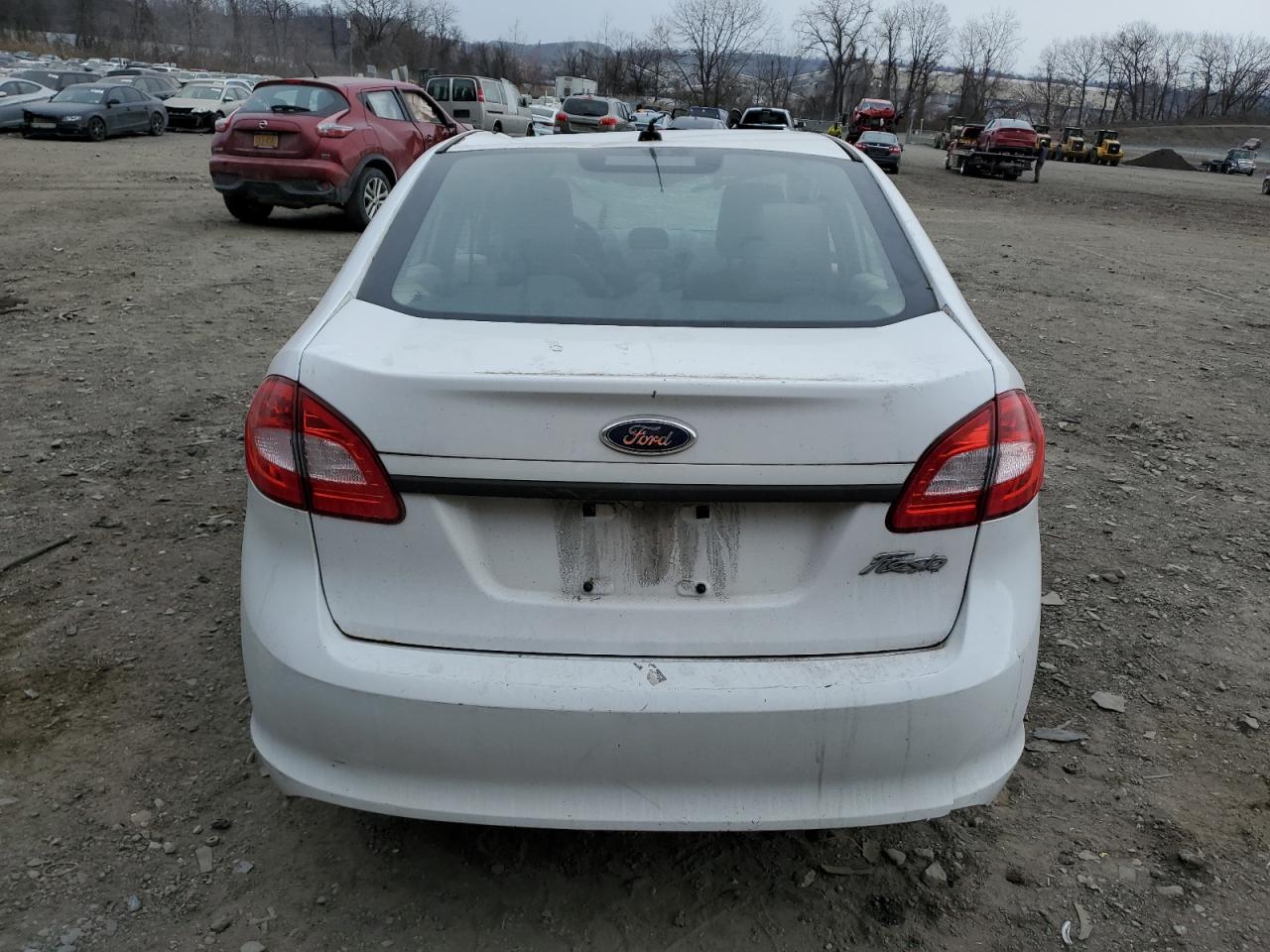 2011 Ford Fiesta VIN 3FADP4AJ3BM238202 Copart auction photo, all over / missing/altered vin damage thumbnail 6