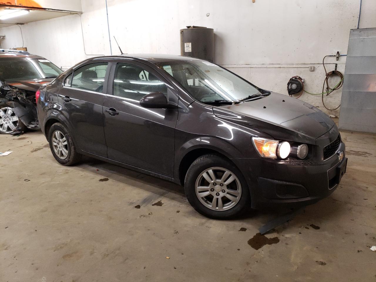 2014 Chevrolet Sonic VIN 1G1JC5SB3E4238733 Copart auction photo, side / front end damage thumbnail 4