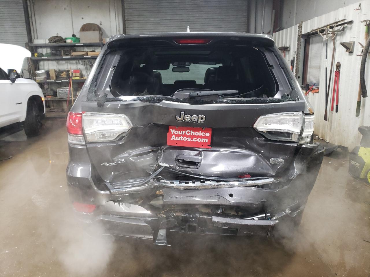 2015 Jeep Grand Cherokee VIN 1C4RJFCT2FC613502 Copart auction photo, rear end damage thumbnail 6