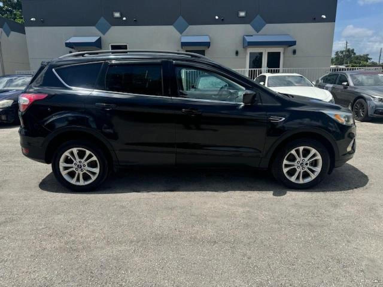 2017 Ford Escape VIN 1FMCU9GD7HUD01945 Copart auction photo, vandalism damage thumbnail 14