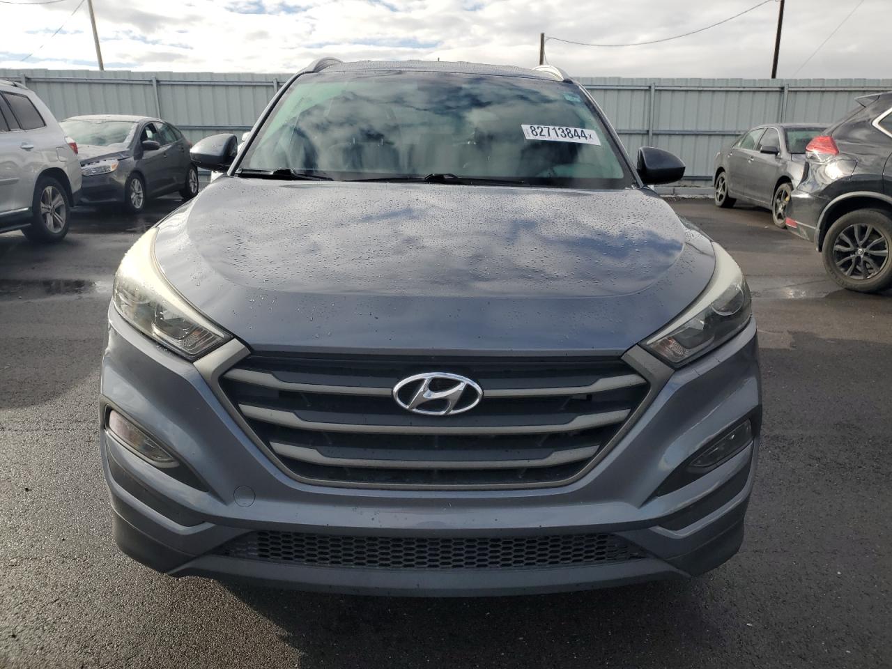 2016 Hyundai Tucson VIN KM8J33A46GU175415 Copart auction photo, rear end damage thumbnail 5