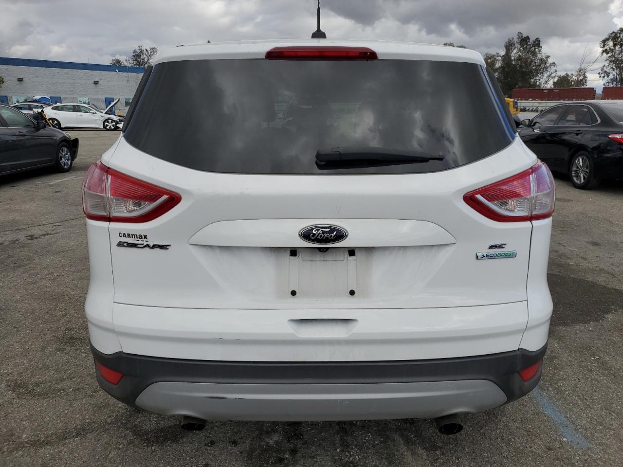 2014 Ford Escape VIN 1FMCU0GX0EUB74814 Copart auction photo, front end damage thumbnail 6